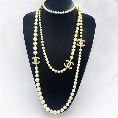 chanel chain necklace 2015|chanel pearl necklace price list.